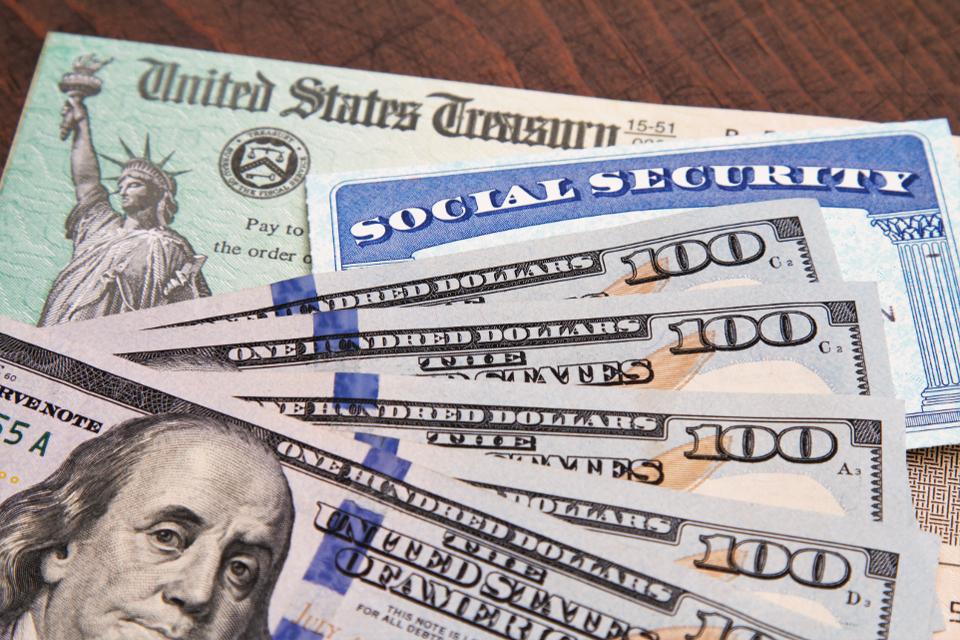 a photo of dollar bills and a social security card